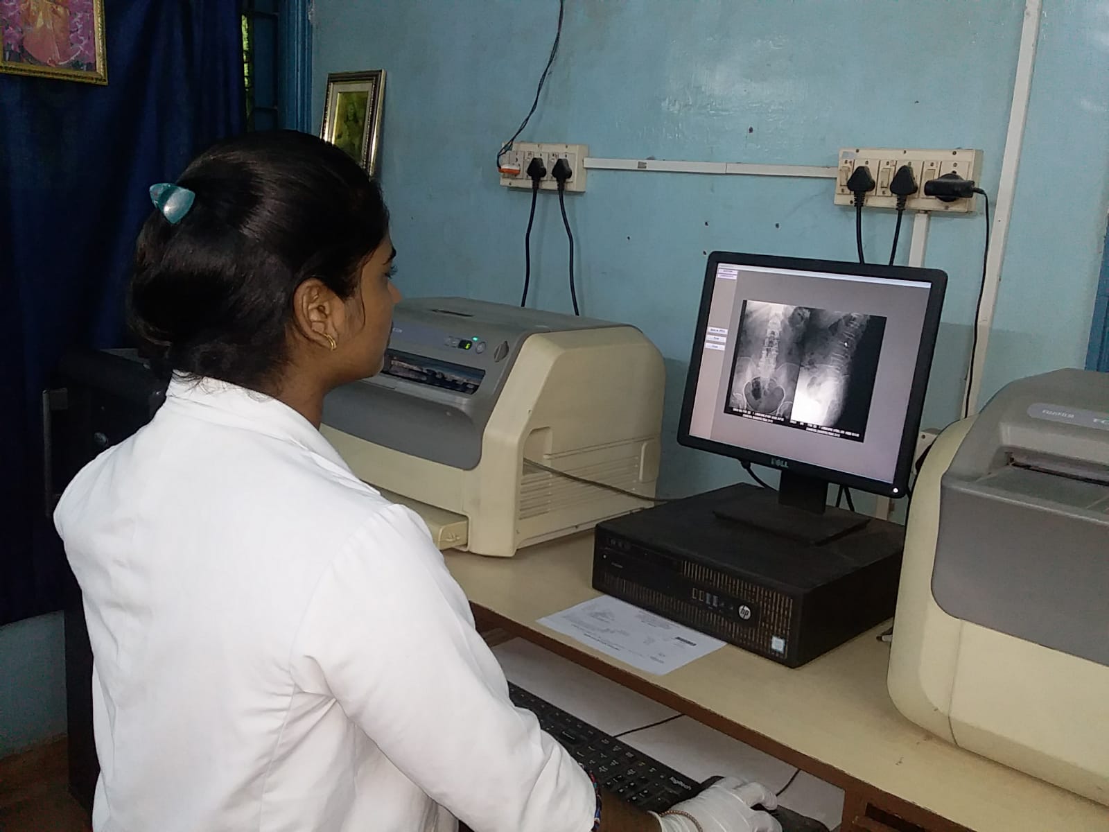 Student running a biochemistry analyzer